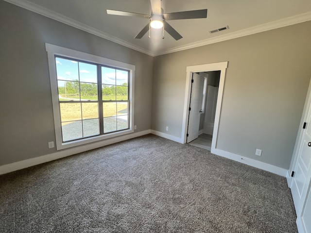 unfurnished bedroom with carpet floors, connected bathroom, ornamental molding, and ceiling fan