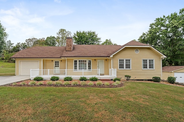 ranch-style house with a front yard and covered porch