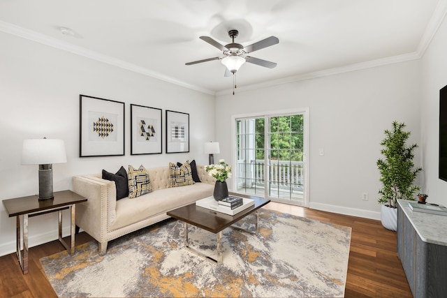 living room with ceiling fan, dark hardwood / wood-style floors, and ornamental molding