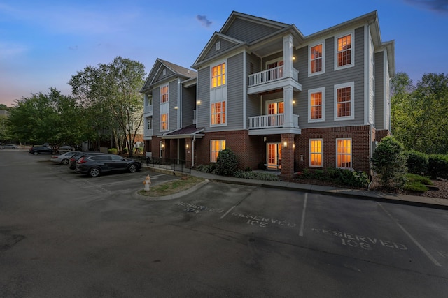 view of front of property with a balcony