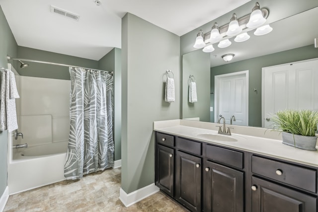 bathroom featuring vanity and shower / tub combo with curtain