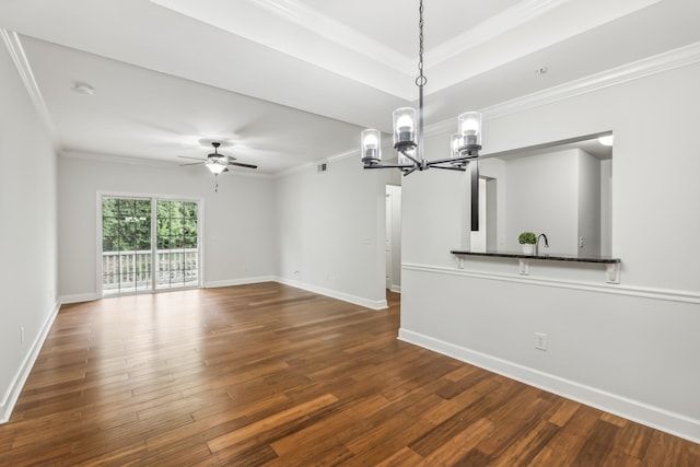 unfurnished room with ornamental molding, sink, ceiling fan with notable chandelier, and dark wood-type flooring