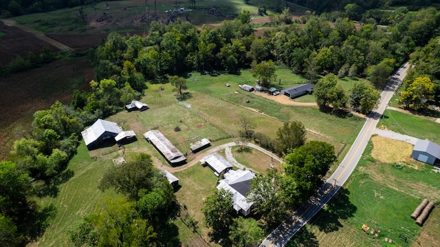 birds eye view of property featuring a rural view