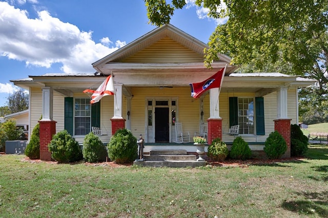 395 Case Rd, Prospect, TN 38477 - view of front of property with covered porch and a front lawn