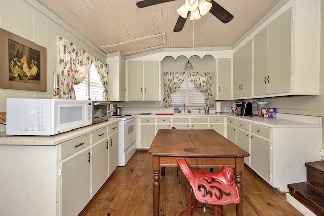 kitchen with ceiling fan, dark hardwood / wood-style flooring, white appliances, and white cabinetry