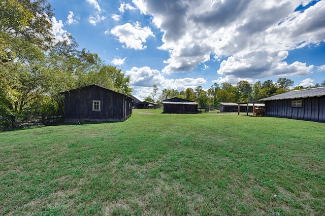 view of yard with an outdoor structure