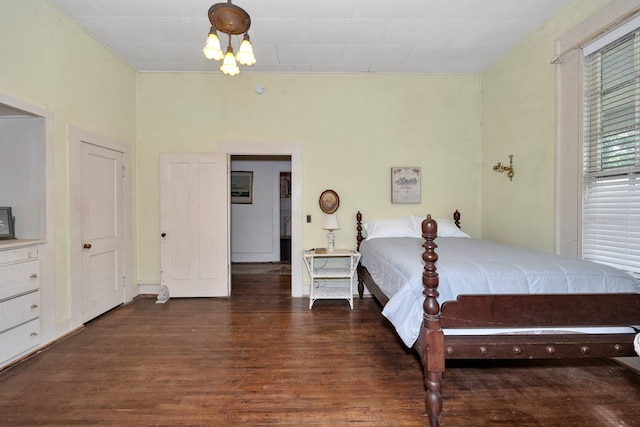 bedroom featuring dark wood-type flooring