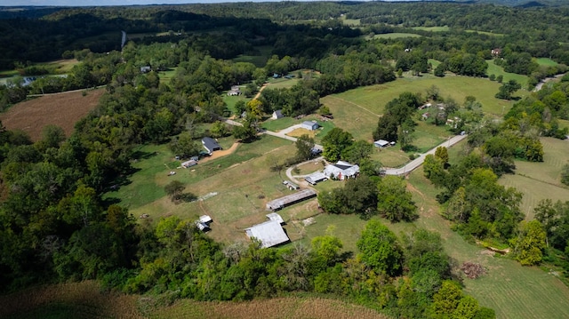 birds eye view of property featuring a rural view