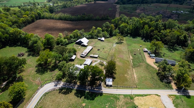 birds eye view of property featuring a rural view