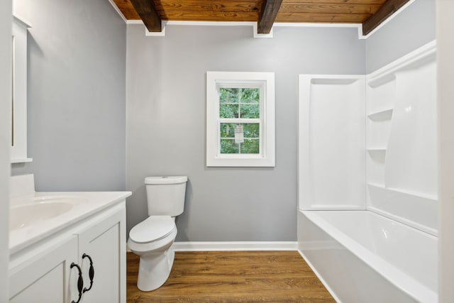 full bathroom with vanity, beam ceiling, hardwood / wood-style flooring, shower / tub combination, and toilet