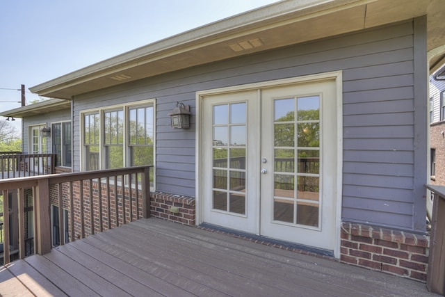 wooden terrace featuring french doors