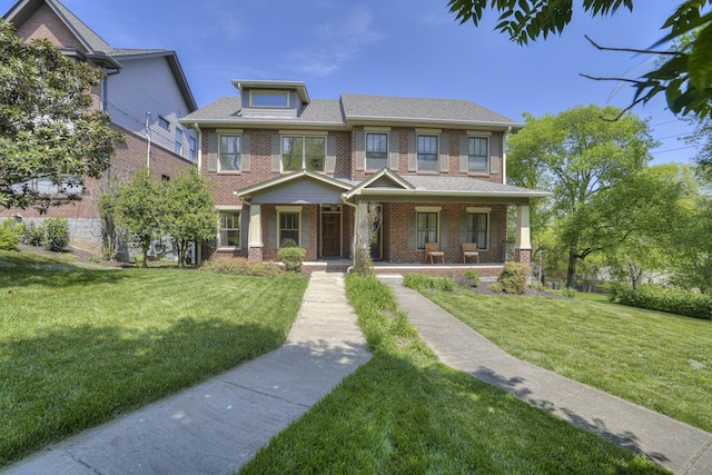 view of front of home featuring a porch and a front lawn