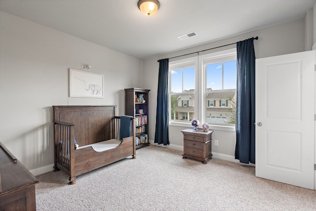 living area featuring light colored carpet