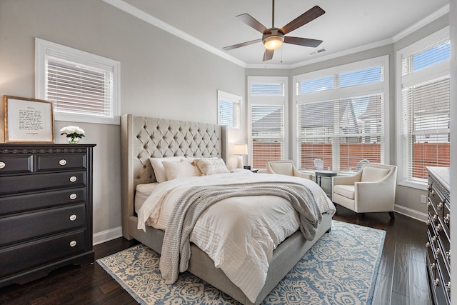 bedroom featuring multiple windows, crown molding, ceiling fan, and dark hardwood / wood-style flooring