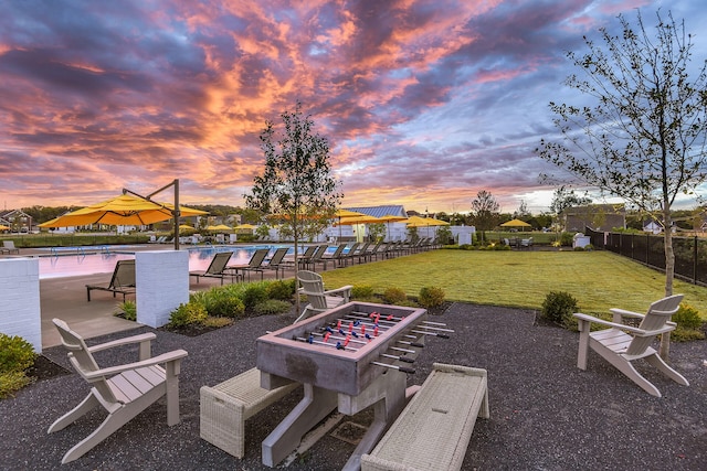 exterior space featuring a patio area and a community pool