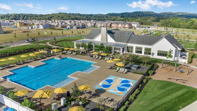 view of swimming pool featuring a patio area