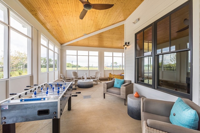 playroom with wood ceiling, lofted ceiling, ceiling fan, and light tile patterned floors