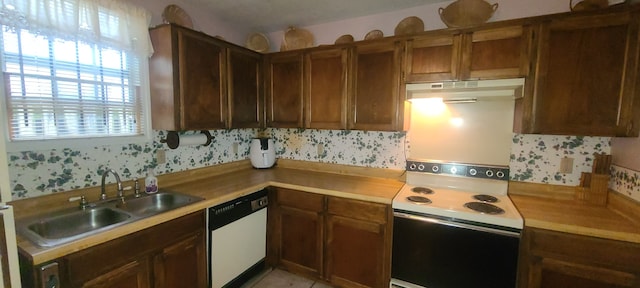 kitchen with white appliances and sink