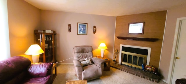 carpeted living room with a fireplace