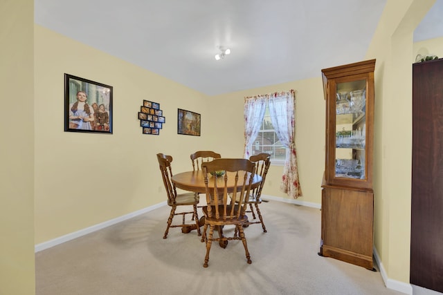 view of carpeted dining room