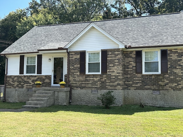 single story home with a front yard