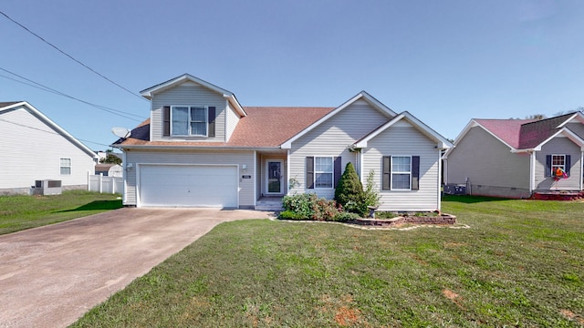 view of front of home with central AC unit, a garage, and a front lawn