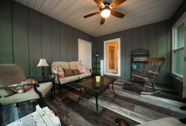 sitting room featuring ceiling fan, wood ceiling, and hardwood / wood-style floors