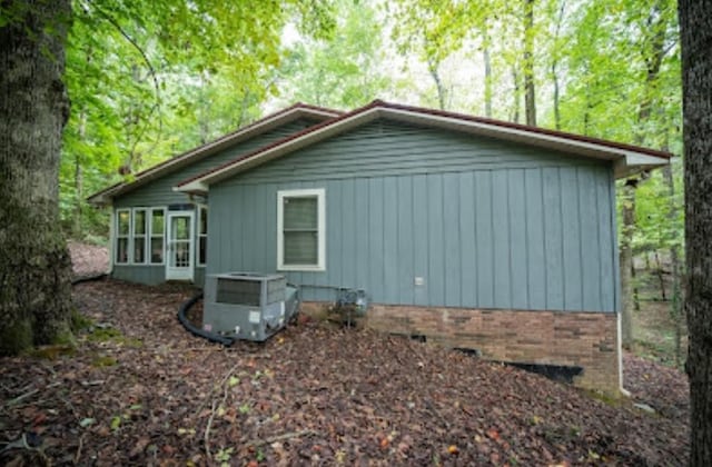 view of home's exterior featuring central air condition unit