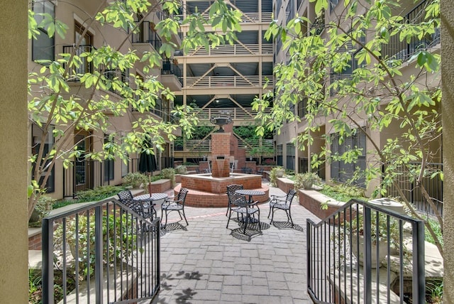 surrounding community featuring a patio