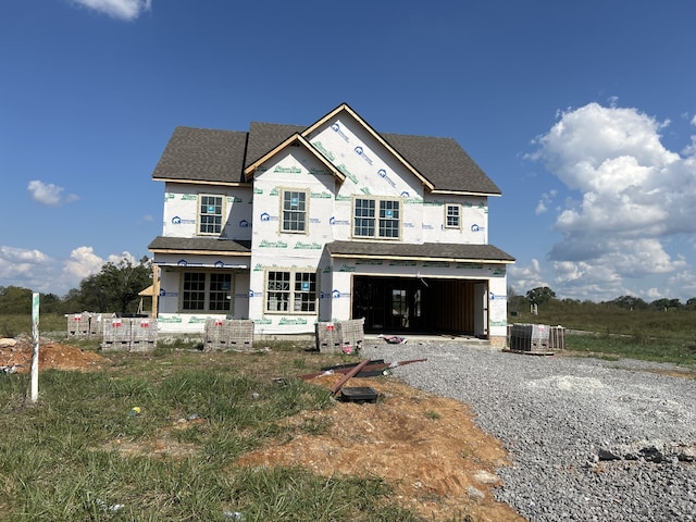 property under construction with a garage and central AC