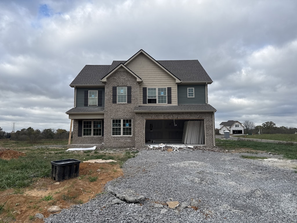 view of front of property featuring a garage