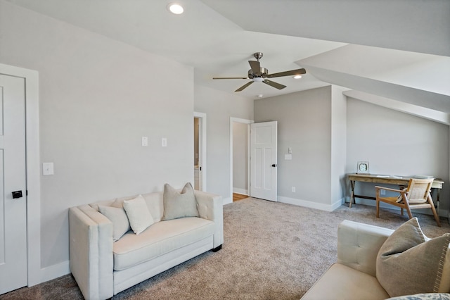 carpeted living room featuring ceiling fan