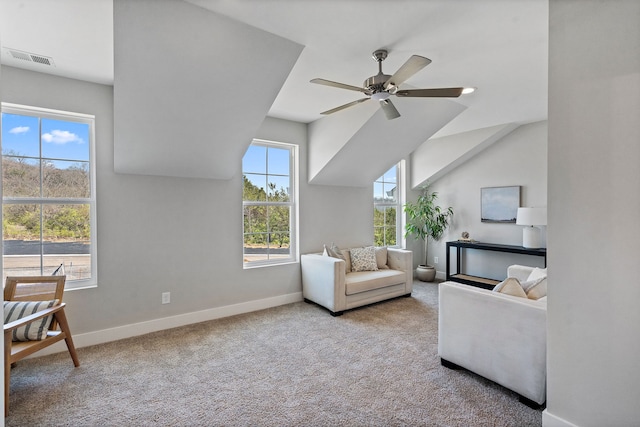 sitting room featuring ceiling fan and light colored carpet