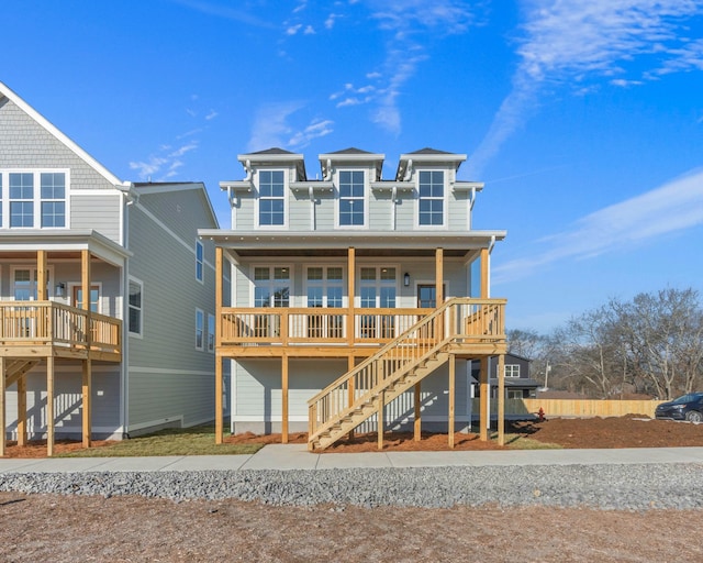 back of property featuring covered porch