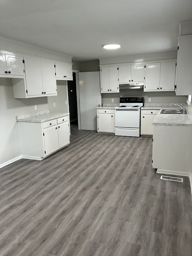 kitchen featuring white cabinets, white electric range oven, sink, and dark wood-type flooring