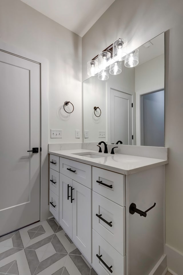 bathroom with vanity and tile patterned floors