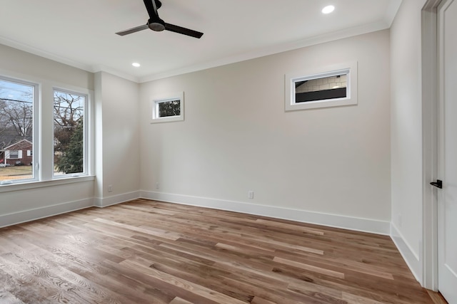 unfurnished room featuring ceiling fan, ornamental molding, and light hardwood / wood-style floors