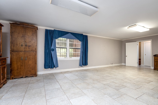 unfurnished room featuring ornamental molding