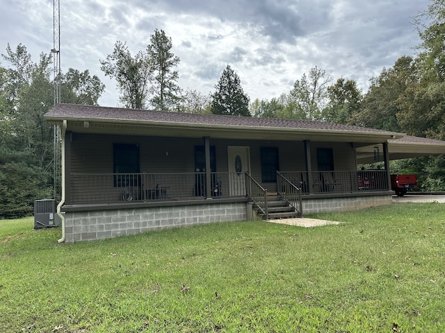 view of front of house featuring central AC unit, a front yard, and a porch