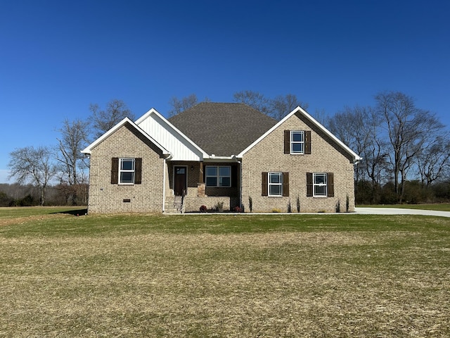 craftsman-style house with a front lawn