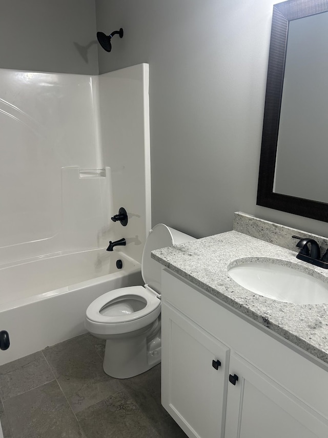 full bathroom with toilet, tile patterned floors, bathing tub / shower combination, and vanity