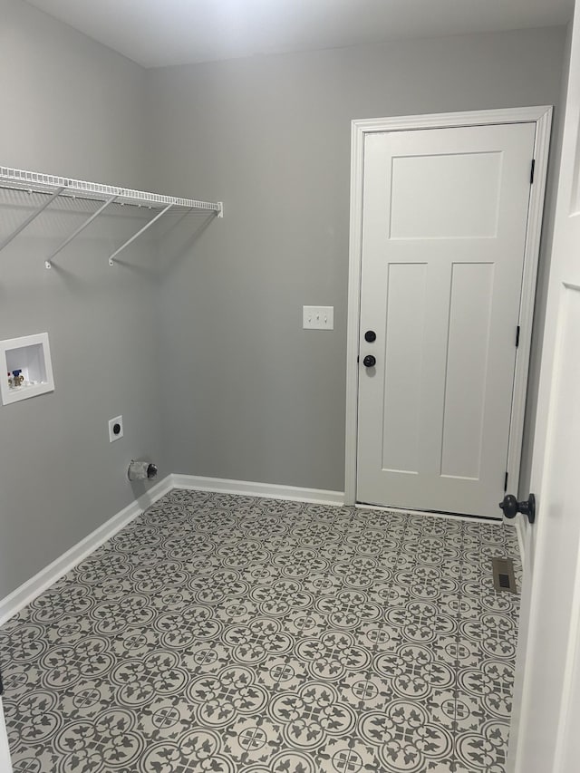 clothes washing area featuring light tile patterned flooring, washer hookup, and hookup for an electric dryer