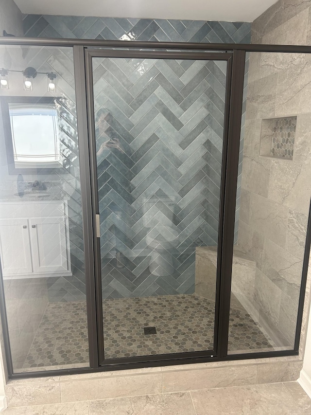 bathroom with an enclosed shower