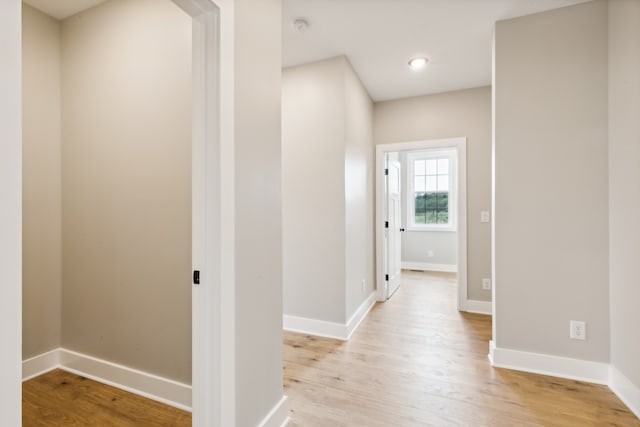 hallway featuring light hardwood / wood-style flooring