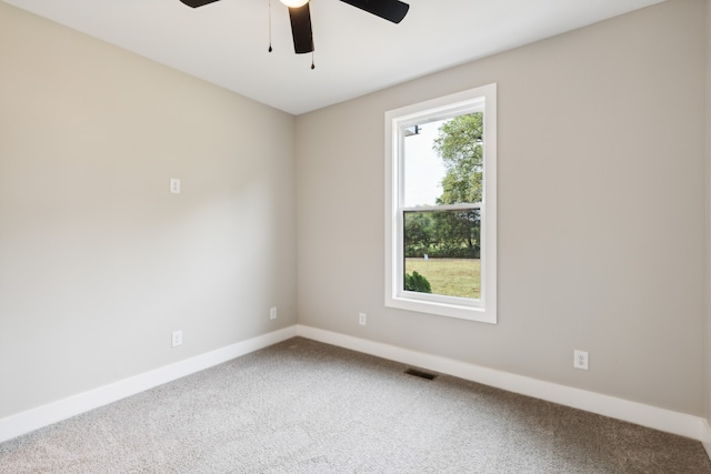 carpeted empty room with ceiling fan