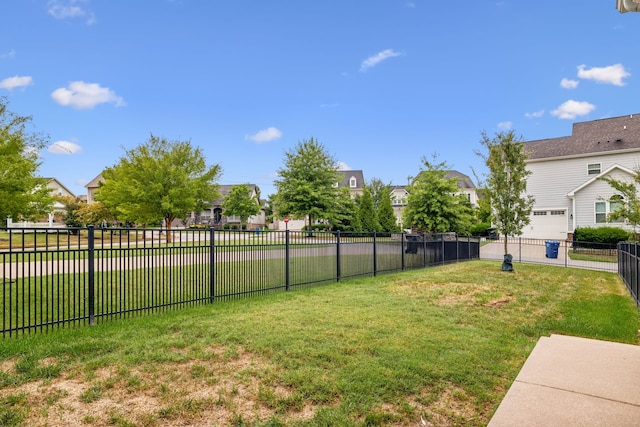 view of yard with a garage