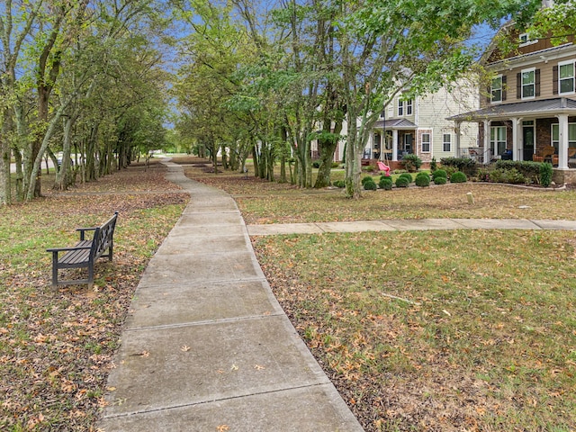 view of property's community featuring a yard