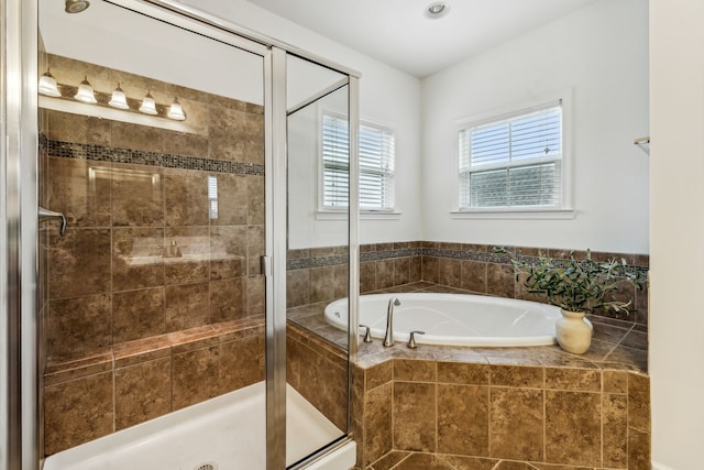 bathroom with independent shower and bath