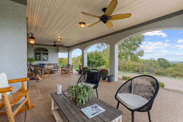 view of patio / terrace featuring an outdoor living space and ceiling fan