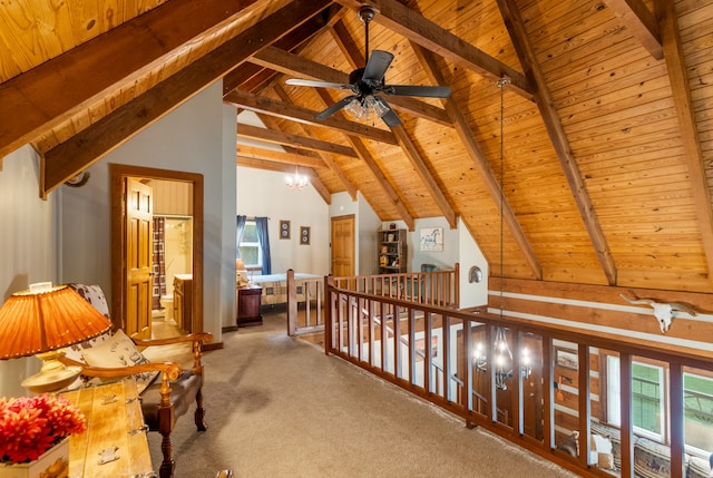 corridor featuring wood ceiling, carpet flooring, and beamed ceiling